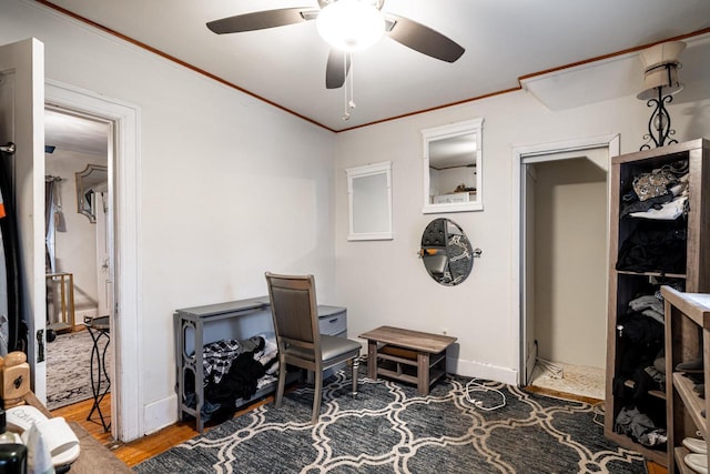 330 E Locust St, Milwaukee, WI 53212 - sitting room featuring ceiling fan, wood finished floors, baseboards, and crown molding