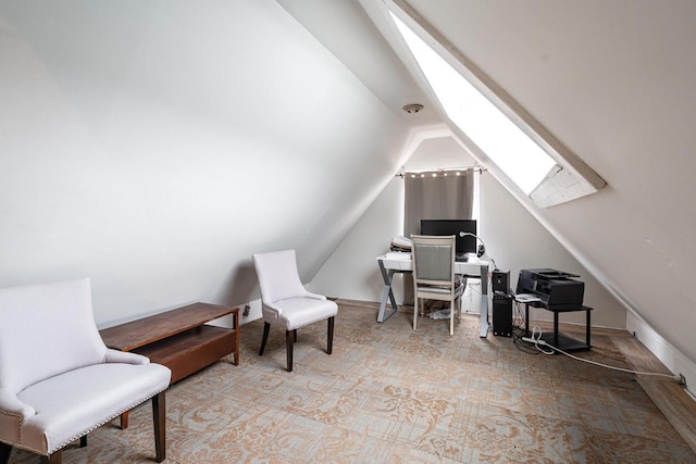 330 E Locust St, Milwaukee, WI 53212 - home office with a skylight, lofted ceiling, and carpet