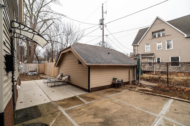 rear view of property featuring a patio area