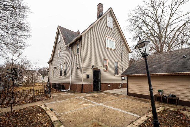 back of house featuring a patio area