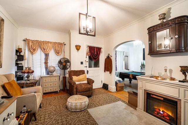 330 E Locust St, Milwaukee, WI 53212 - sitting room featuring arched walkways, pool table, light wood finished floors, and ornamental molding