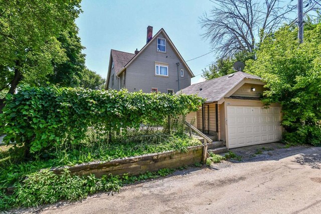 view of home's exterior with a garage