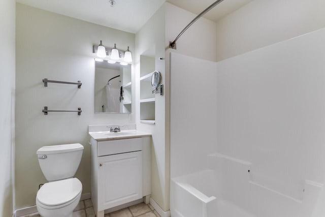 full bathroom featuring tile patterned floors, bathing tub / shower combination, vanity, and toilet