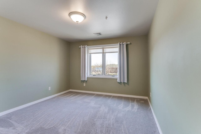 view of carpeted spare room