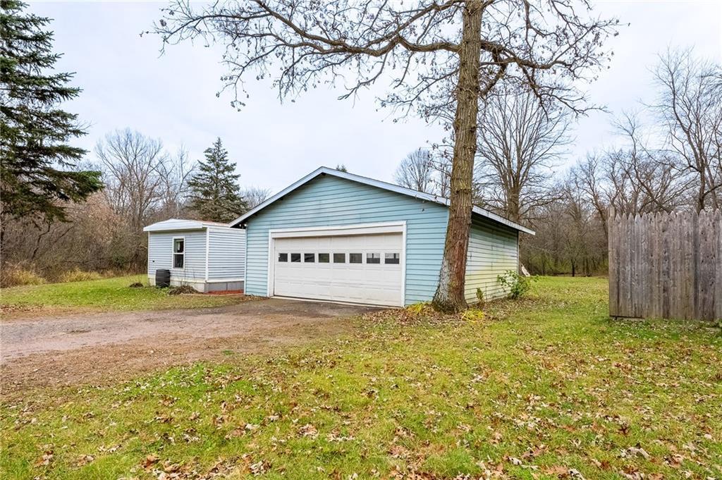 garage featuring a yard