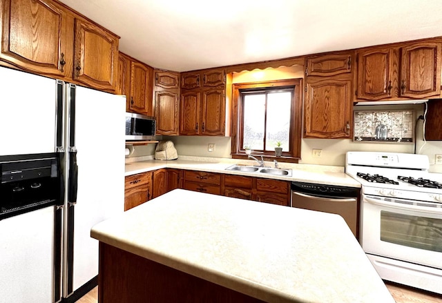 kitchen featuring appliances with stainless steel finishes and sink