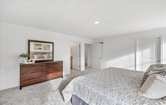 bedroom with light colored carpet