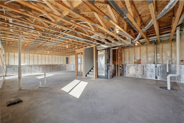 basement featuring heating unit