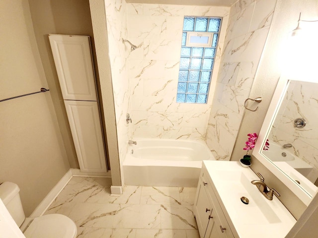 bathroom featuring vanity, toilet, and a tub