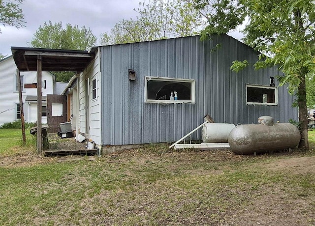 33135 Fulton St, Lone Rock, WI 53556 - view of property exterior featuring a lawn