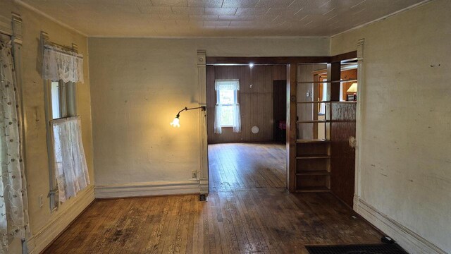 33135 Fulton St, Lone Rock, WI 53556 - empty room featuring hardwood / wood-style flooring and baseboards