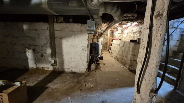 33135 Fulton St, Lone Rock, WI 53556 - unfinished below grade area featuring gas water heater