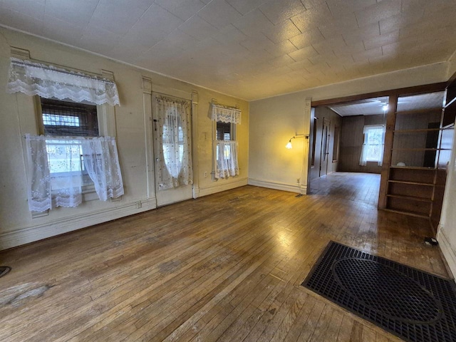 foyer with wood-type flooring