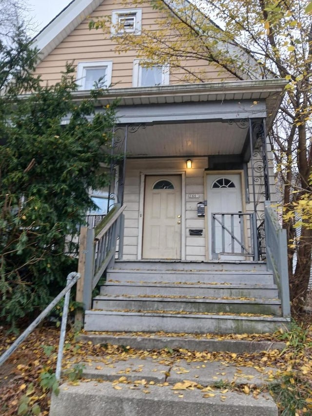 entrance to property with a porch