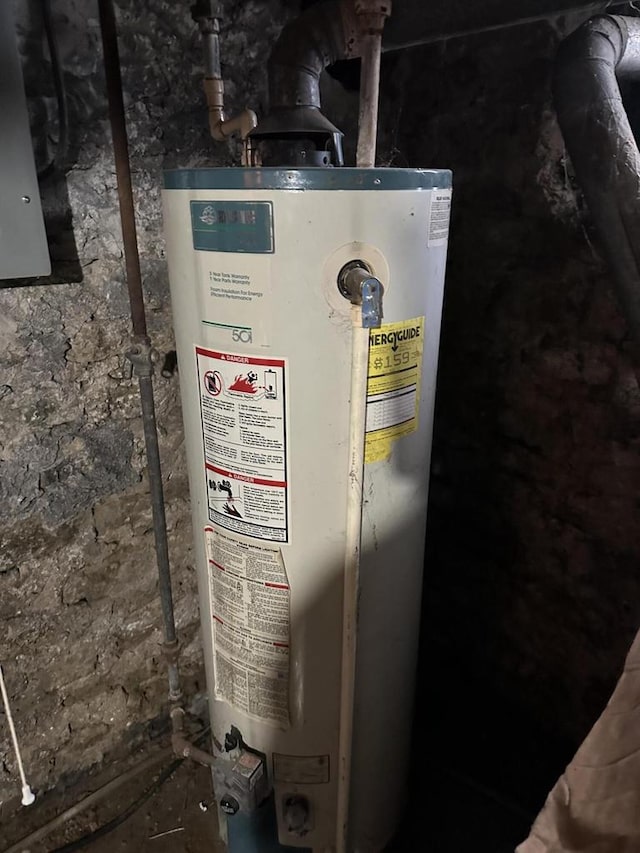 utility room with water heater