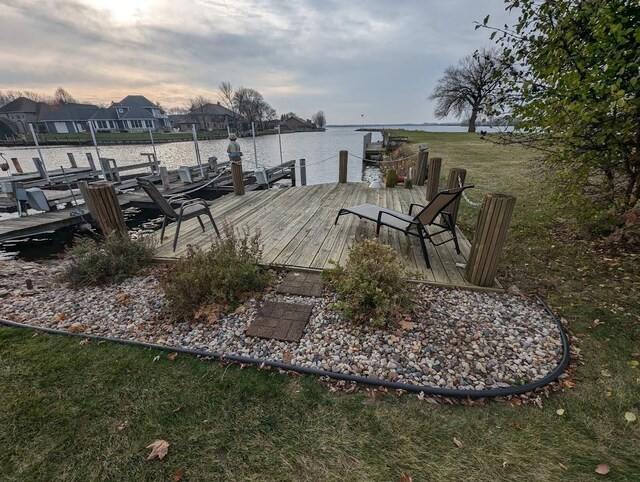 dock area featuring a water view