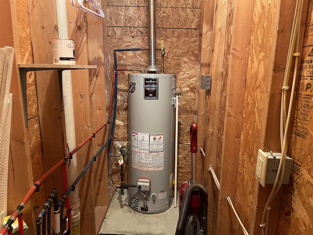 utility room featuring gas water heater