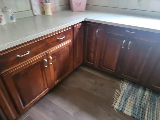 kitchen featuring dark wood-type flooring