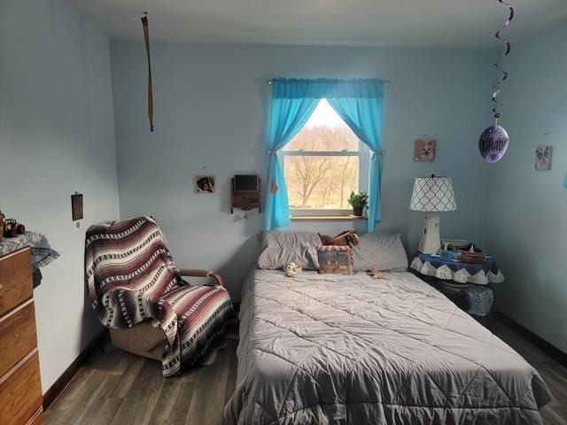 bedroom featuring hardwood / wood-style flooring