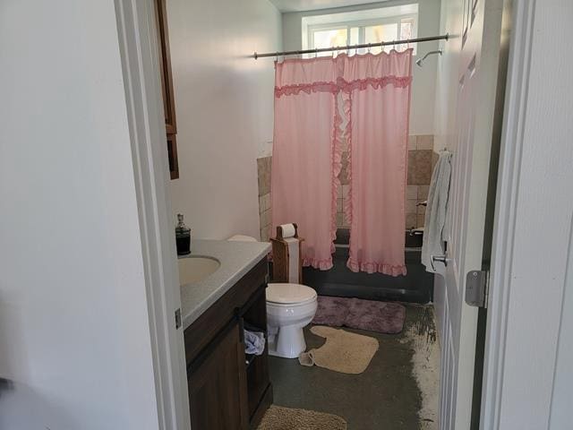 full bathroom with vanity, toilet, and shower / bath combo