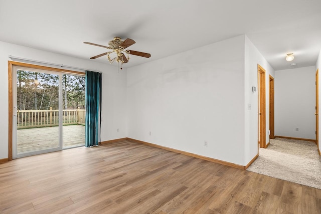 unfurnished room with ceiling fan and light hardwood / wood-style flooring