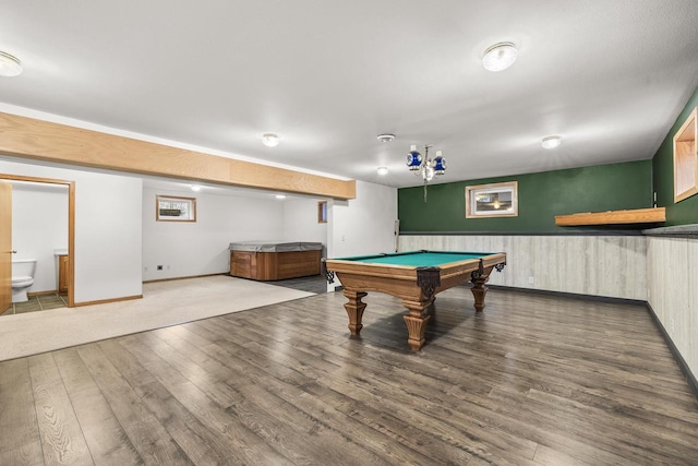 game room with hardwood / wood-style flooring, wooden walls, and pool table