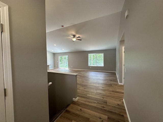 empty room featuring hardwood / wood-style flooring and ceiling fan