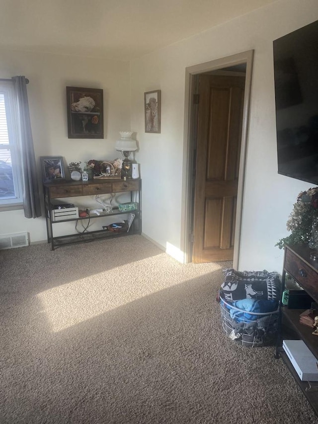 living room featuring carpet flooring