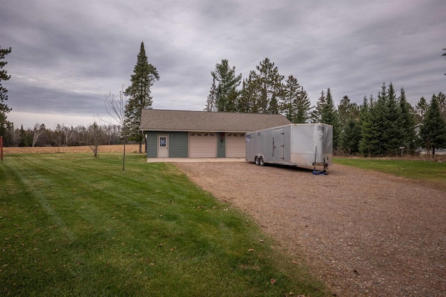 garage with a lawn