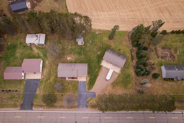 birds eye view of property featuring a rural view