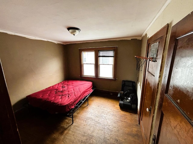 bedroom featuring crown molding