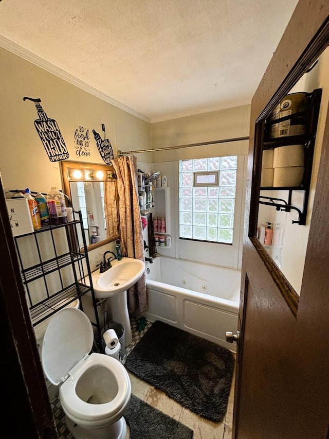 full bathroom with sink, tile patterned flooring, crown molding, shower / bath combination with curtain, and a textured ceiling