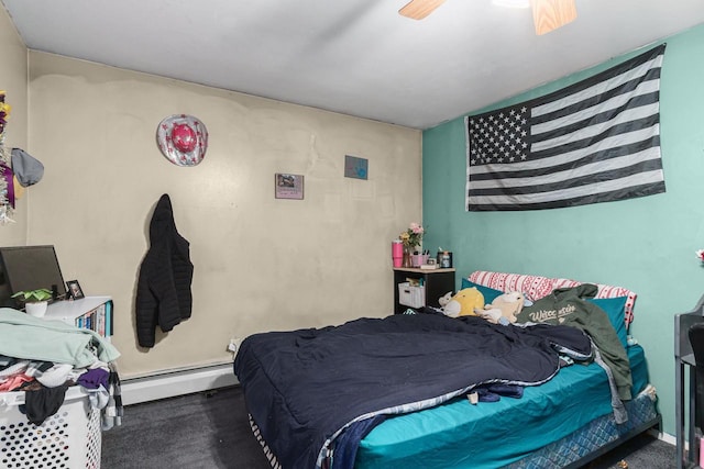bedroom with ceiling fan, dark carpet, and baseboard heating