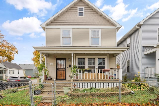 view of front property featuring covered porch