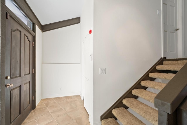 entrance foyer featuring light tile patterned floors