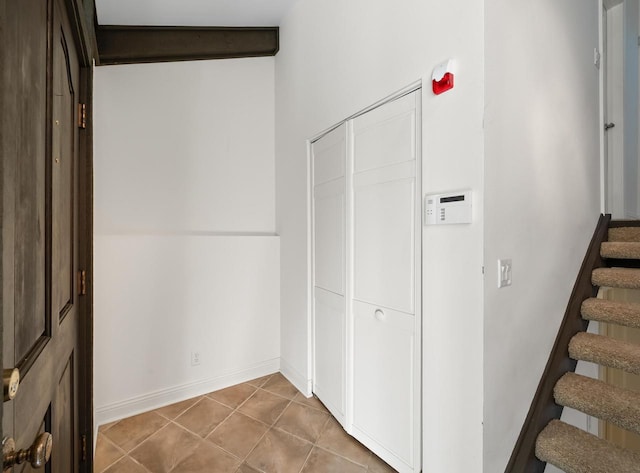 interior space with tile patterned floors