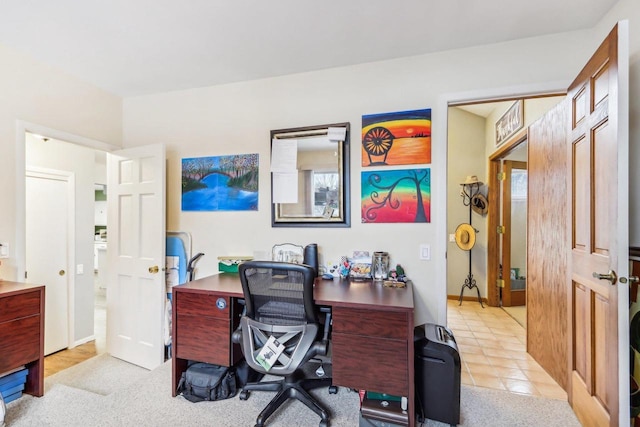 home office with light tile patterned flooring