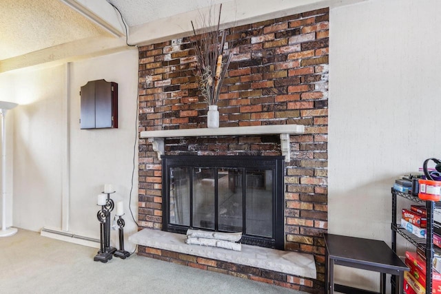 details featuring a fireplace, a textured ceiling, and carpet floors