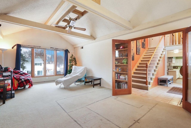 carpeted bedroom featuring vaulted ceiling with beams and a textured ceiling