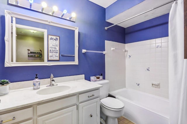 full bathroom featuring tile patterned floors, vanity, shower / tub combo, and toilet