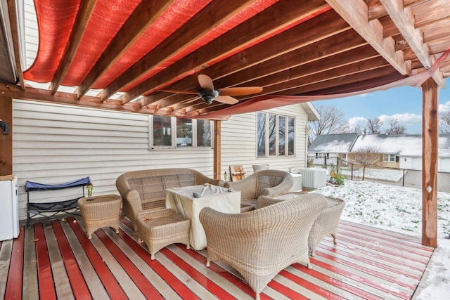 snow covered deck with central AC, an outdoor living space, and ceiling fan