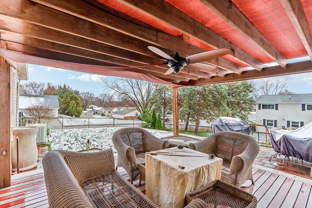 wooden terrace featuring central AC unit and ceiling fan