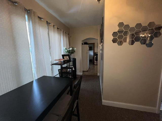 view of carpeted dining space