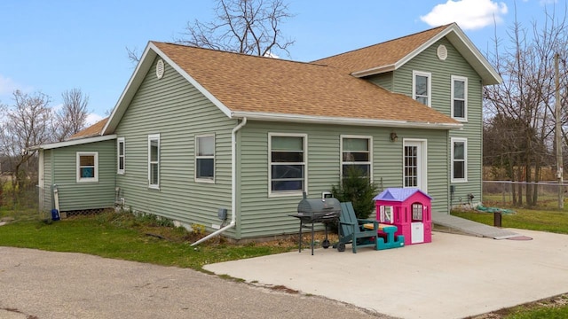 rear view of property with a patio