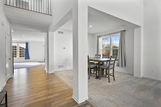 dining room with hardwood / wood-style flooring