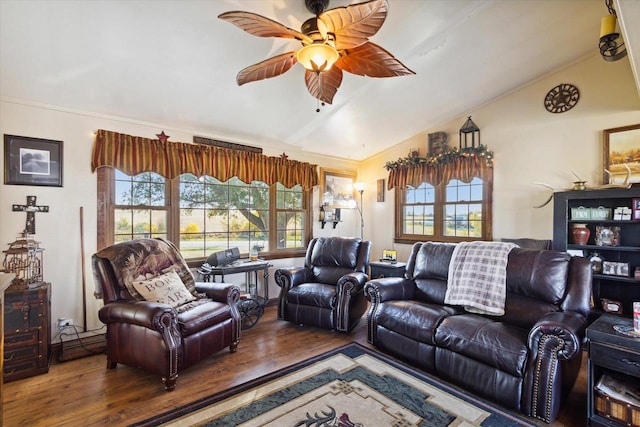 living room with ceiling fan, hardwood / wood-style floors, crown molding, and lofted ceiling