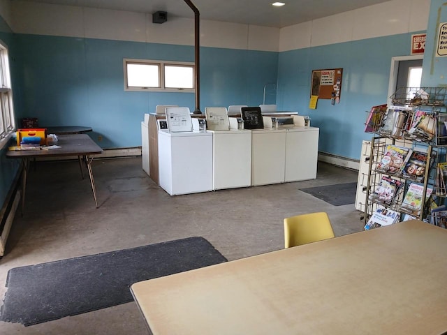 laundry area with washing machine and clothes dryer