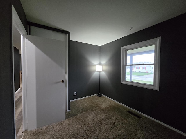 view of carpeted spare room