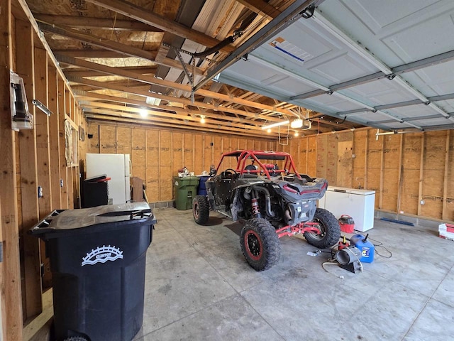 garage featuring white refrigerator