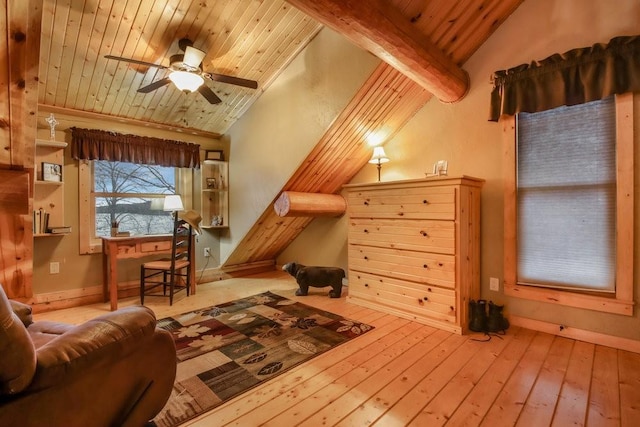 additional living space featuring wooden ceiling, light hardwood / wood-style flooring, ceiling fan, and lofted ceiling with beams